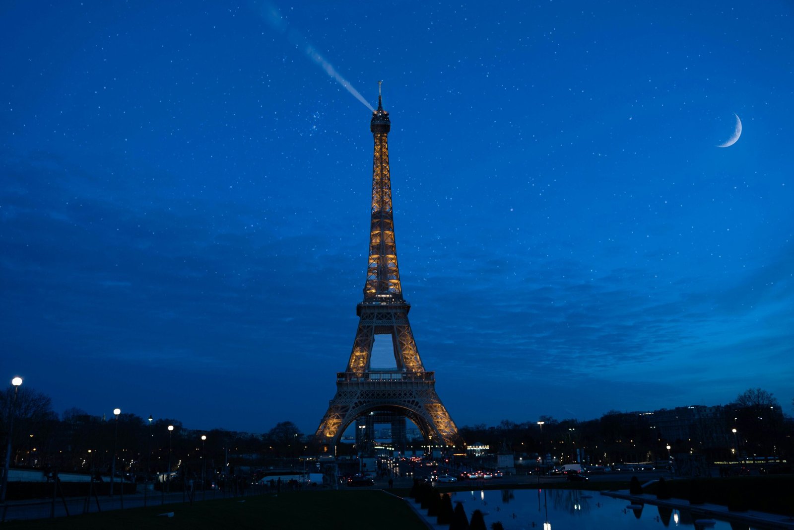 The Eiffel Tower in Paris, a popular destination within the Schengen Area, lit up at night.