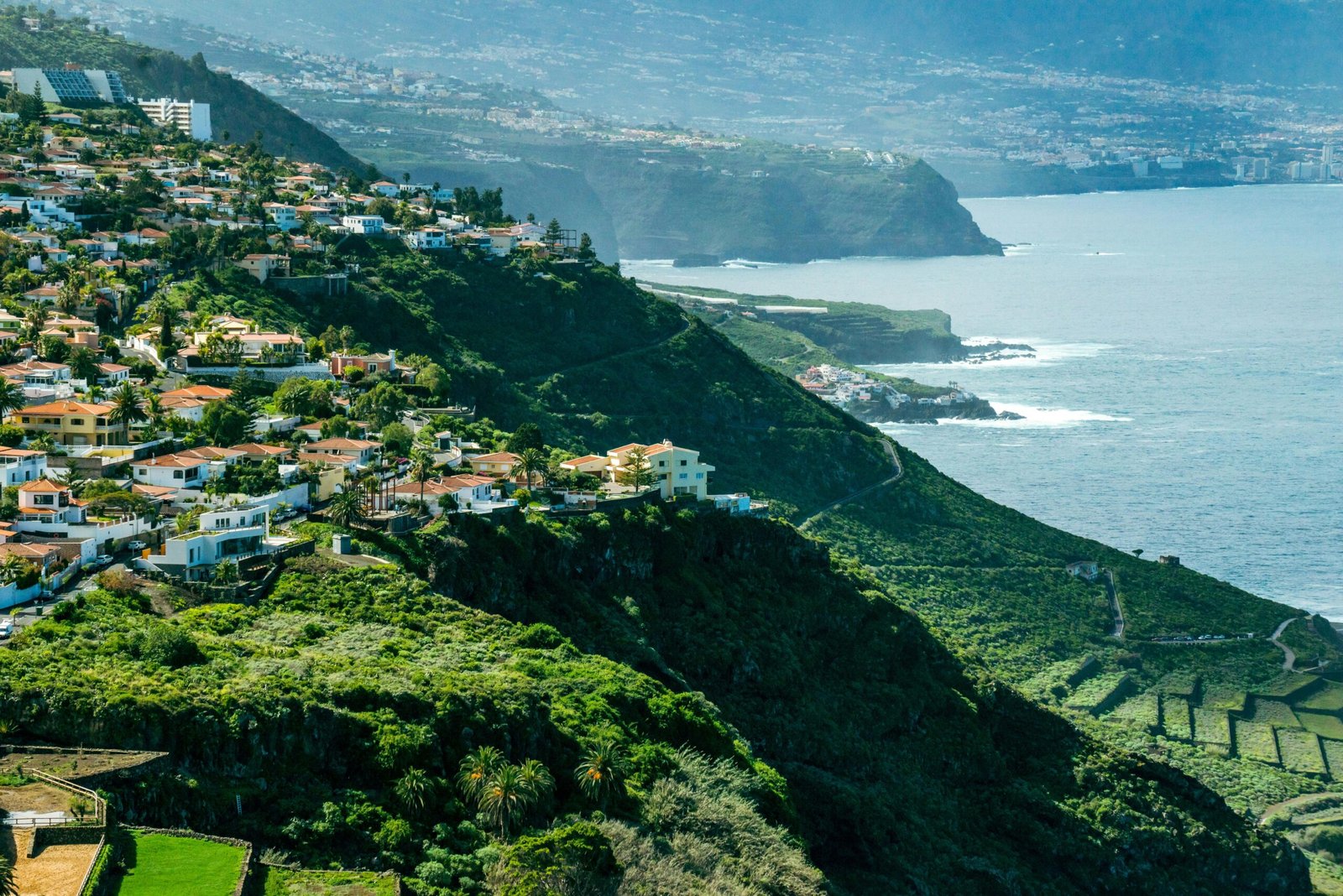 A cozy vacation rental house in Spain with a patio overlooking the Mediterranean Sea.