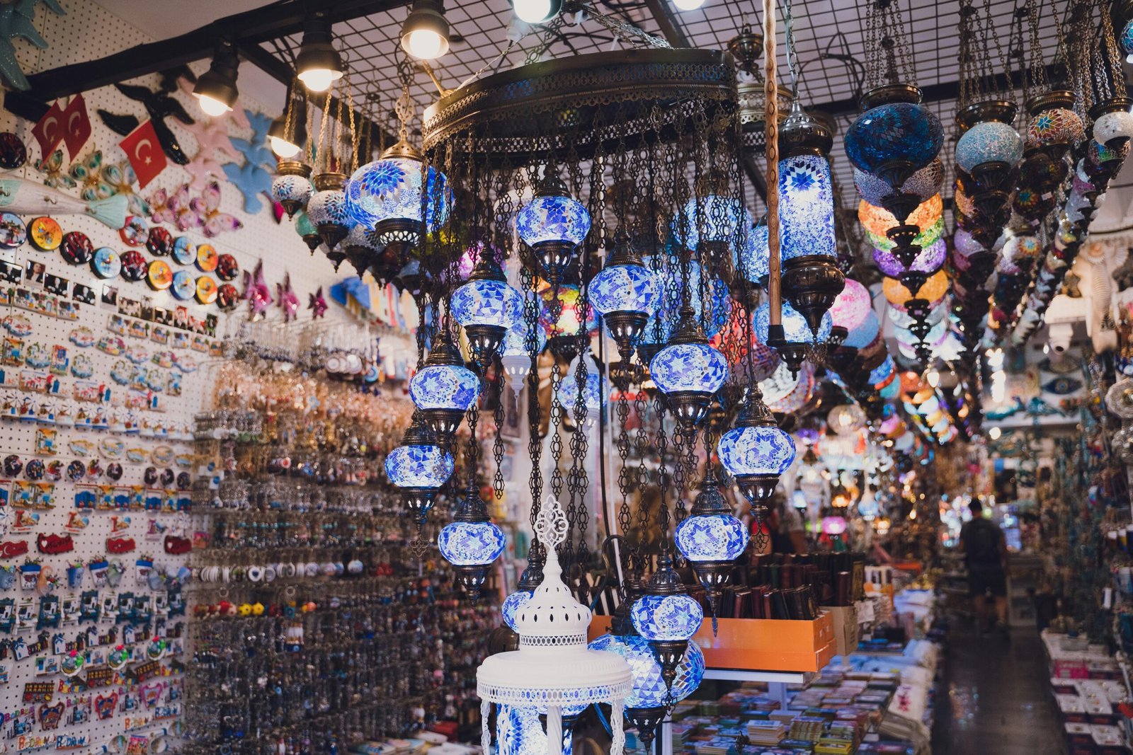 Vibrant scene in Bodrum's marketplace showcasing traditional Turkish mosaic lanterns.