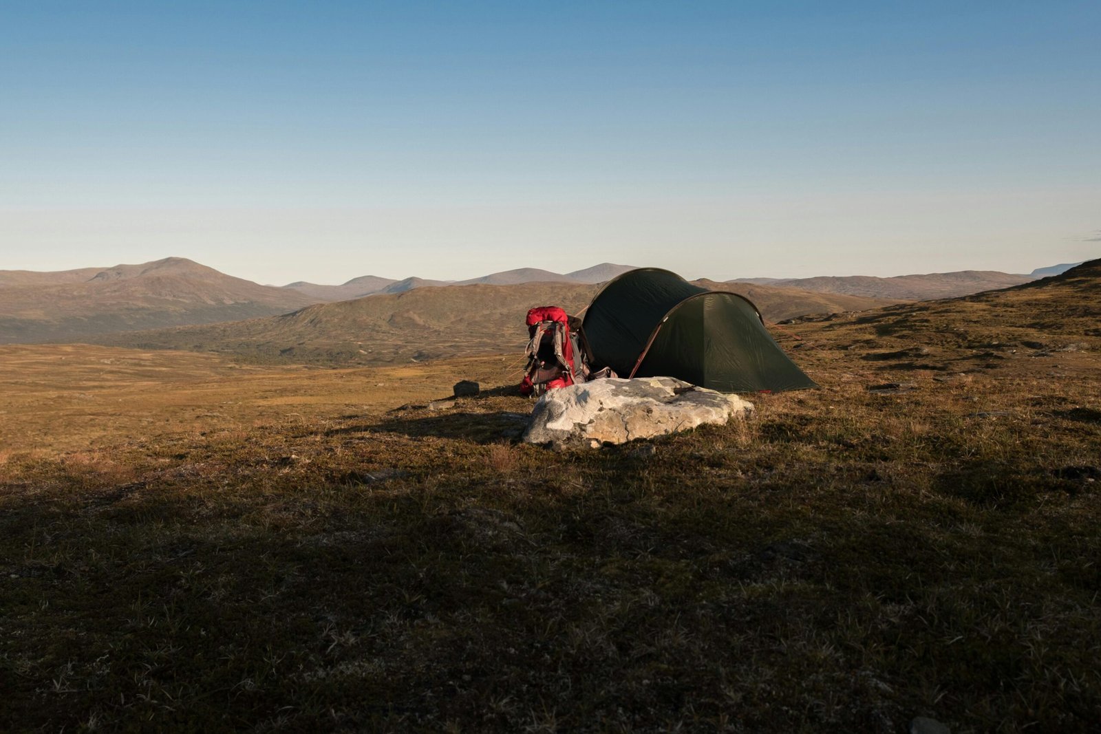 A luxurious tent setup in a remote European wilderness.