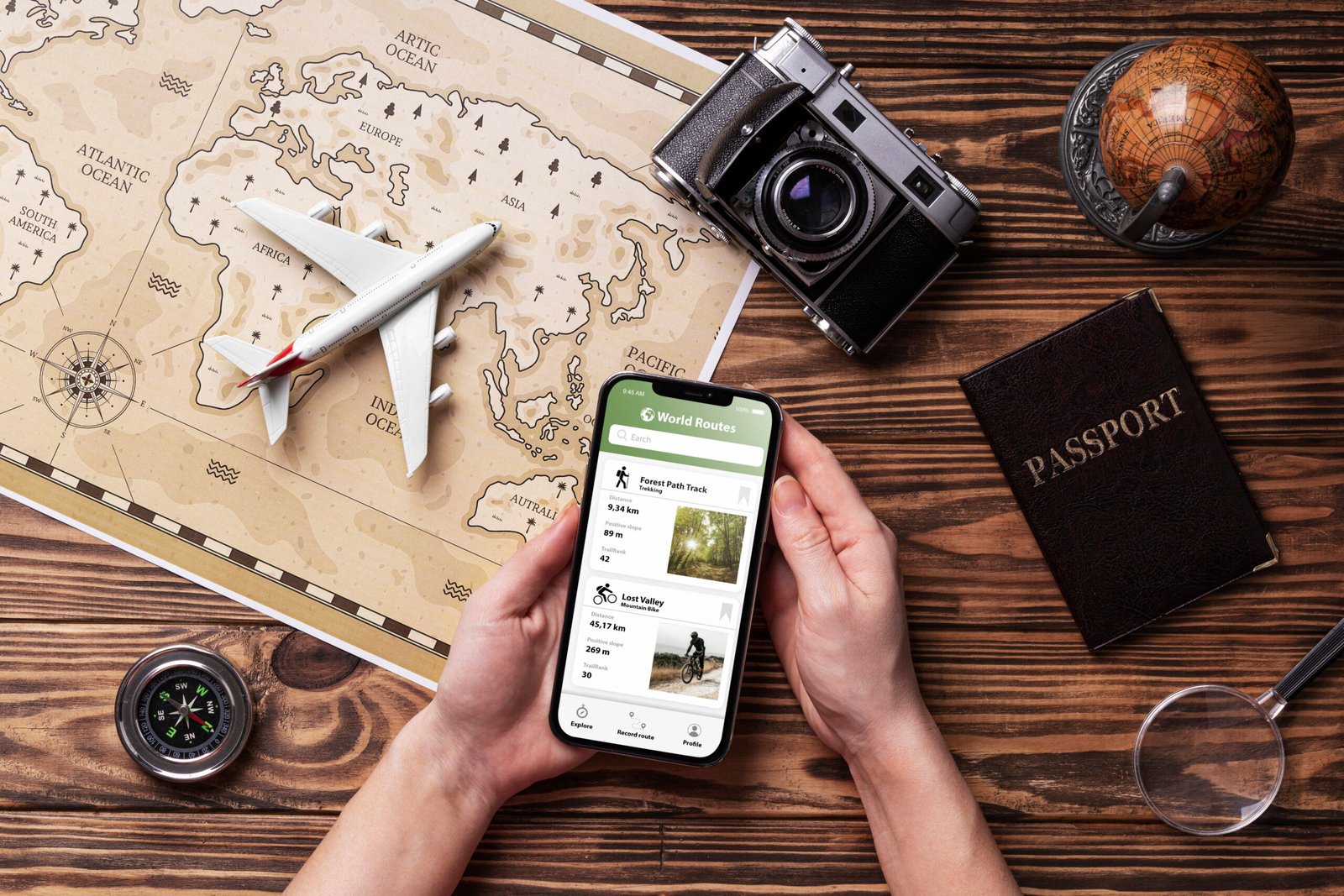 A smartphone displaying a travel safety app with maps and alerts.