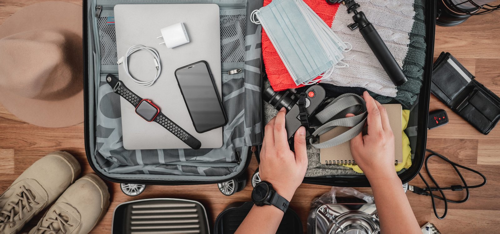 A traveler packing outdoor essentials and multi-functional gear for a South American summer journey.