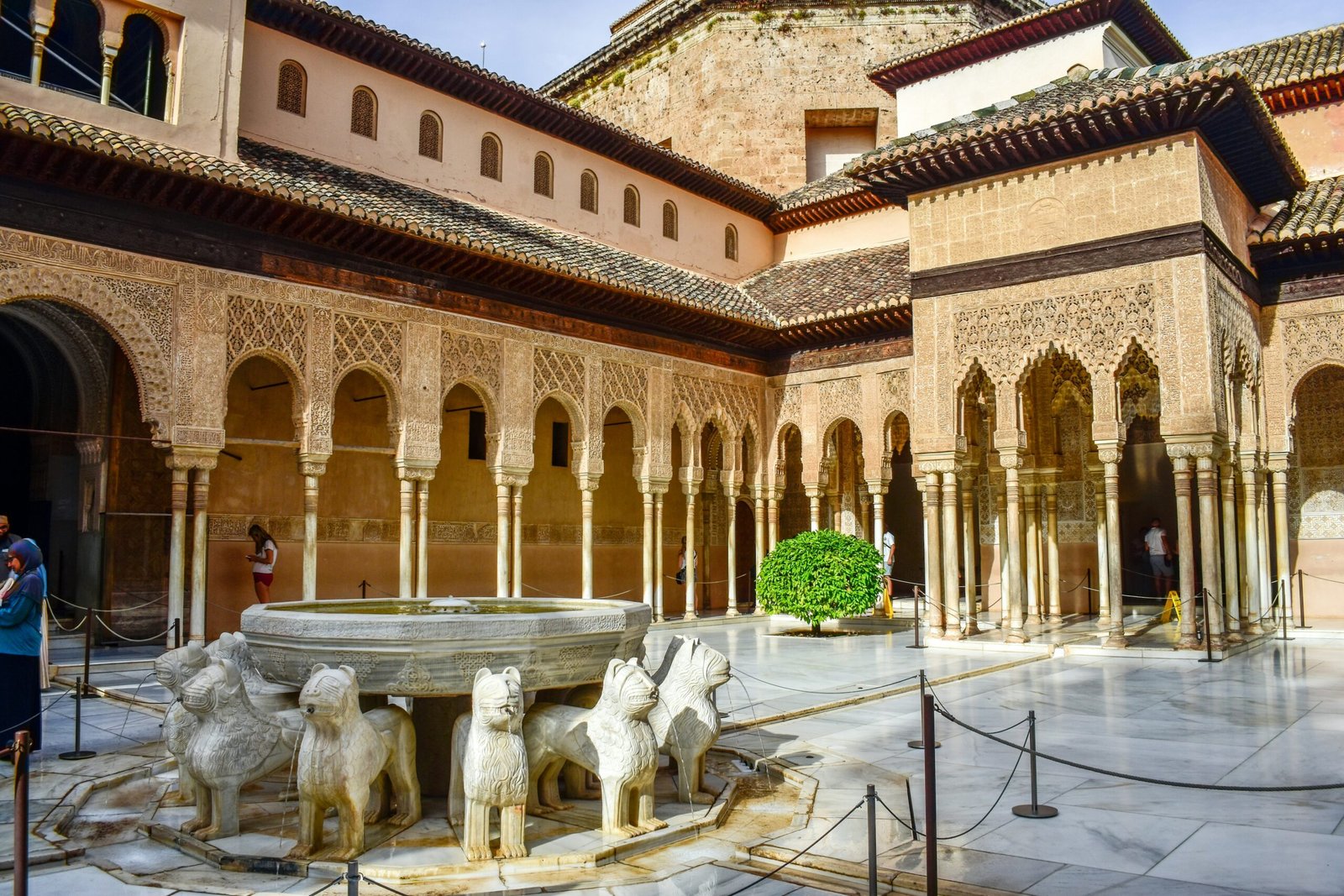 The iconic Court of the Lions within the Nasrid Palaces at the Alhambra, Granada.