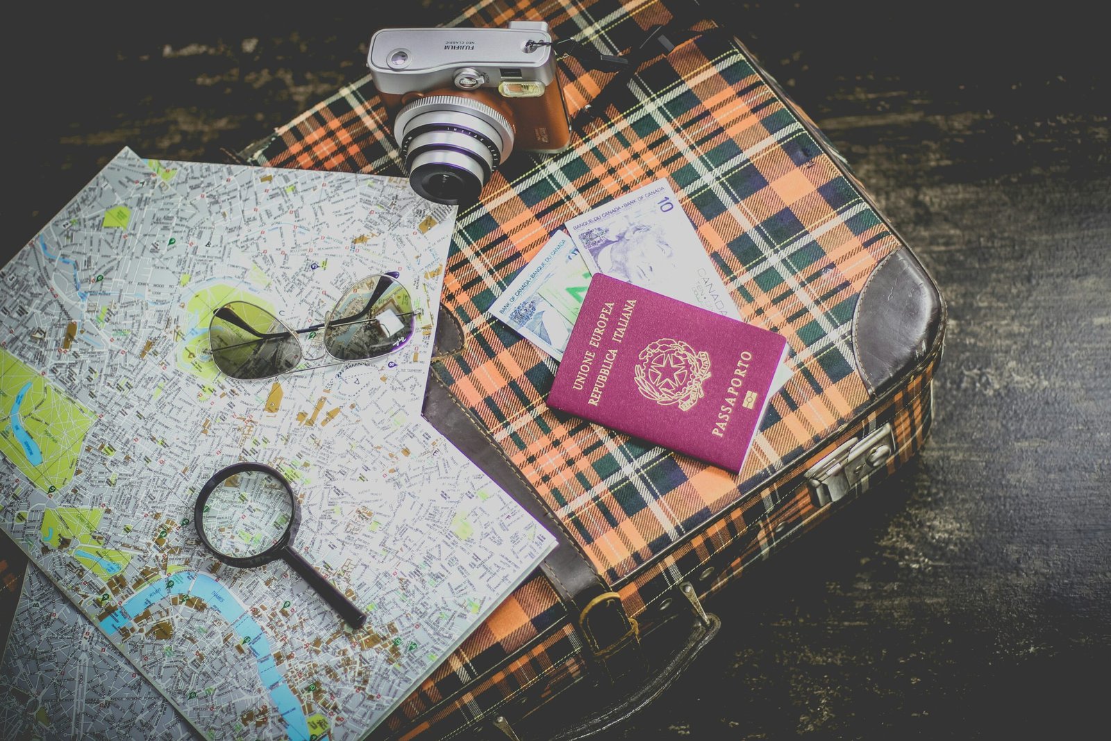 A flat lay of travel preparation essentials.