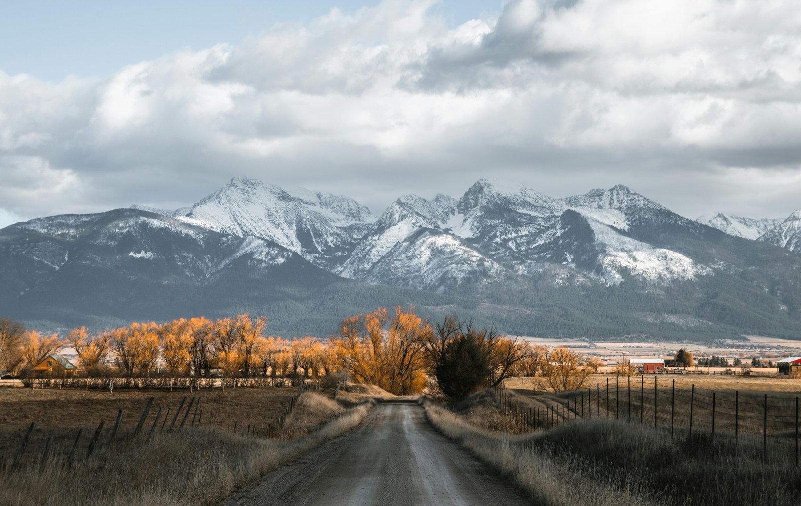 Discover the breathtaking autumn landscape with snow-capped mountains in Montana, USA.