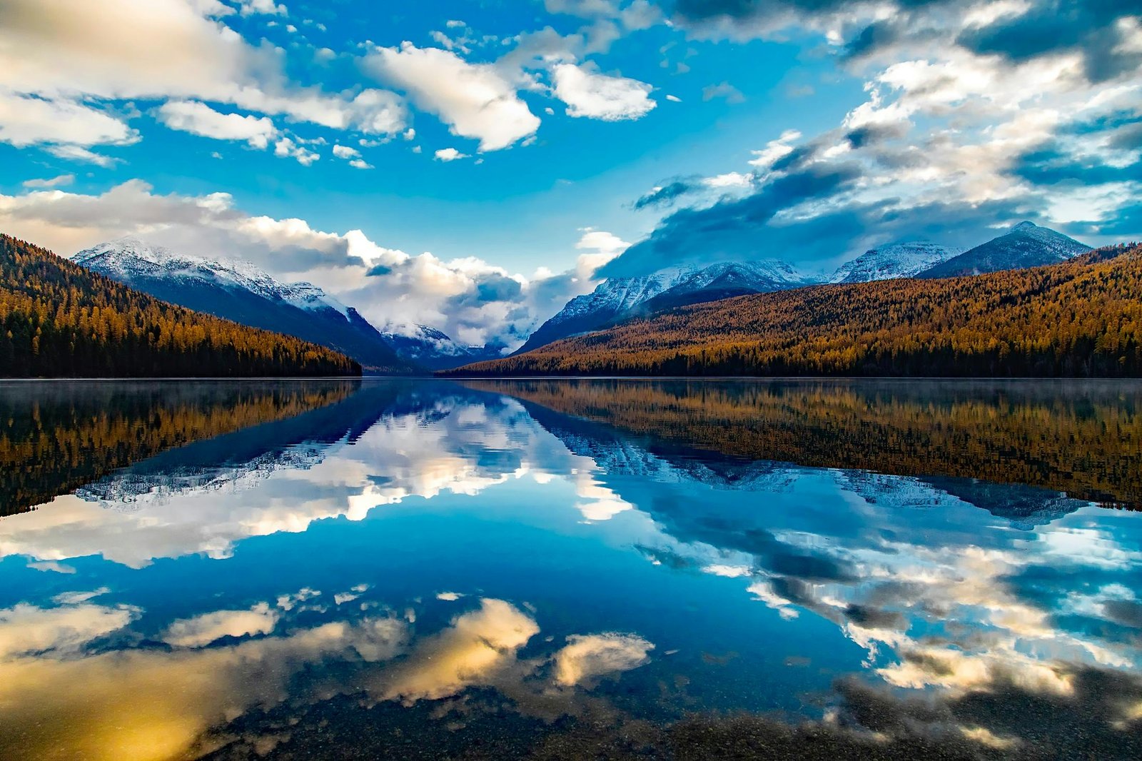 Breathtaking view of Lake McDonald with mountain reflection in Montana.