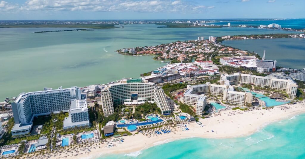 Stunning aerial shot of Cancun's pristine beaches and luxury resorts along the coast.